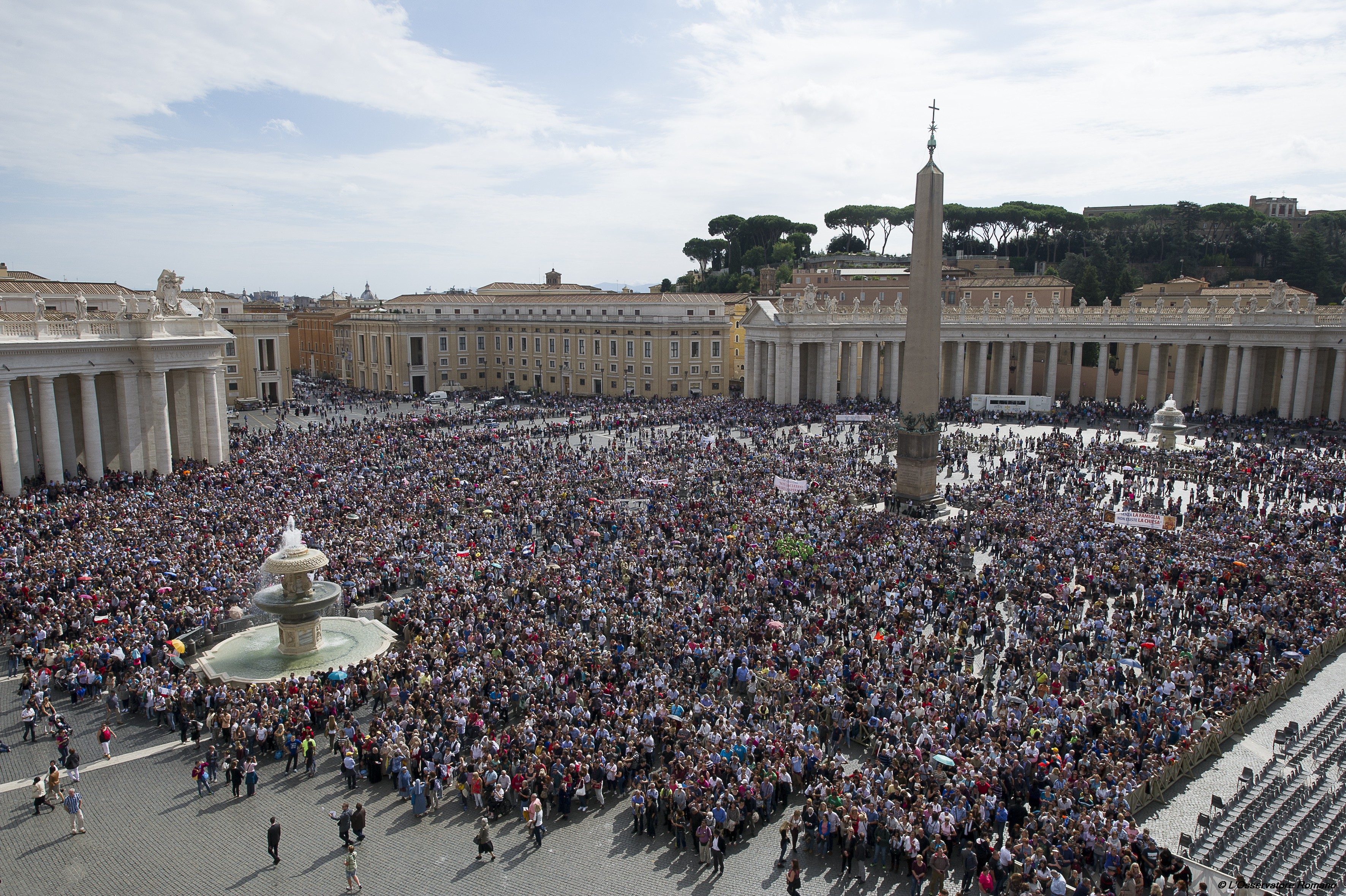 Faithful during the prayer of the Angelus in St. Peter square on Sunday