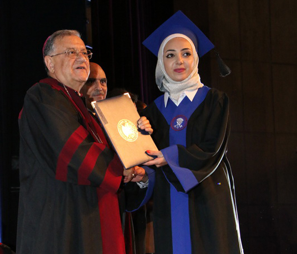 Patriach Twal Graduation celebration at American University with muslim student / Madaba