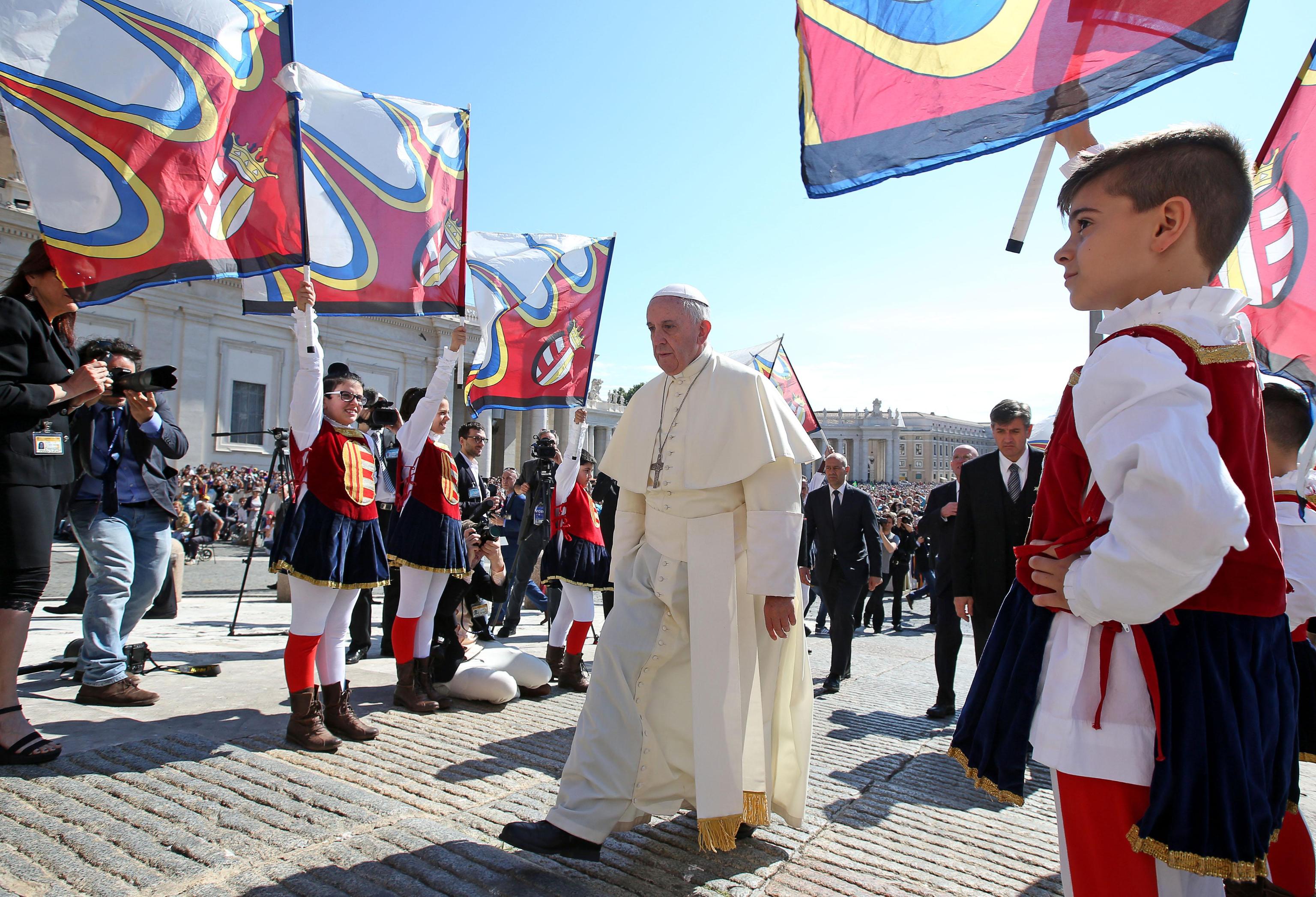 Pope Francis arrives for his weekly general audience in St. Peter's Square