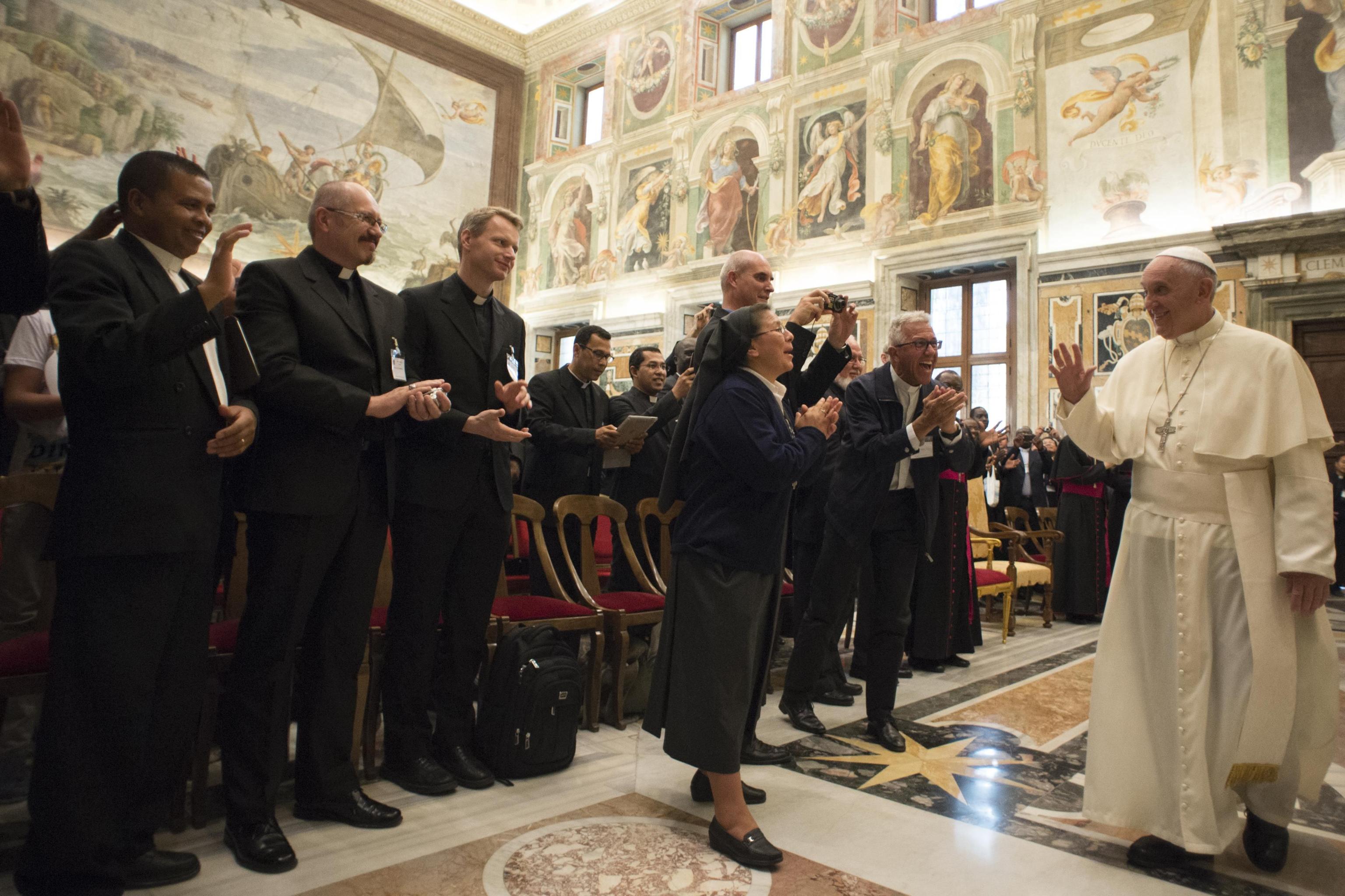 Pope Francis greets participants in the general assembly of Pontifical Mission Societies