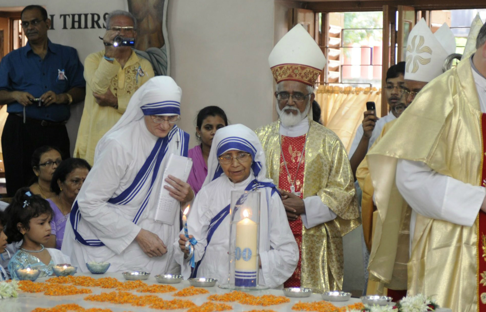 Sister Nirmala (C) celebrating Mother Teresa's 100th birth anniversary at their Missionaries of Charity house in Kolkata