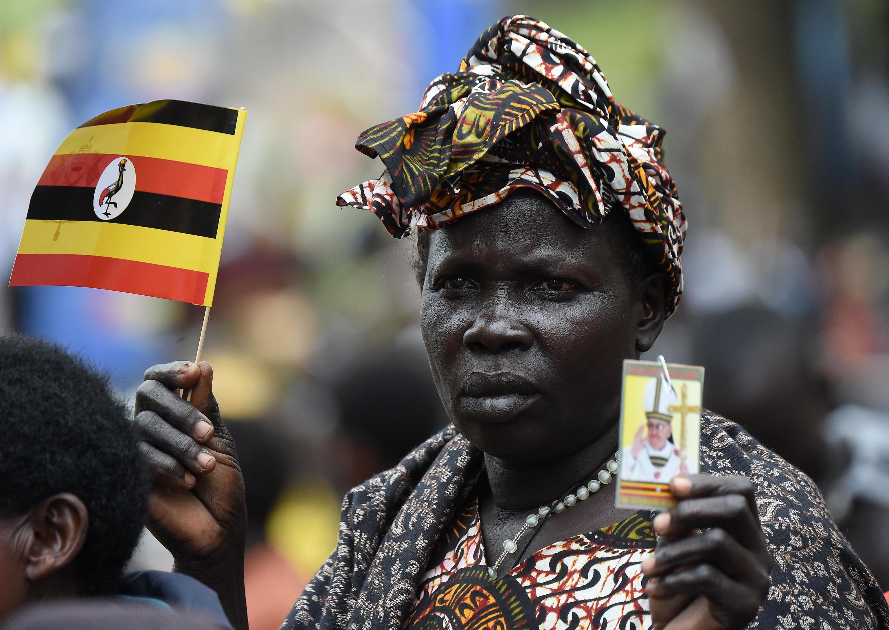 A woman attends a Mass for the martyrs of Uganda celebrated by Pope Francis near the Catholic shrine of Namugongo in Kampala