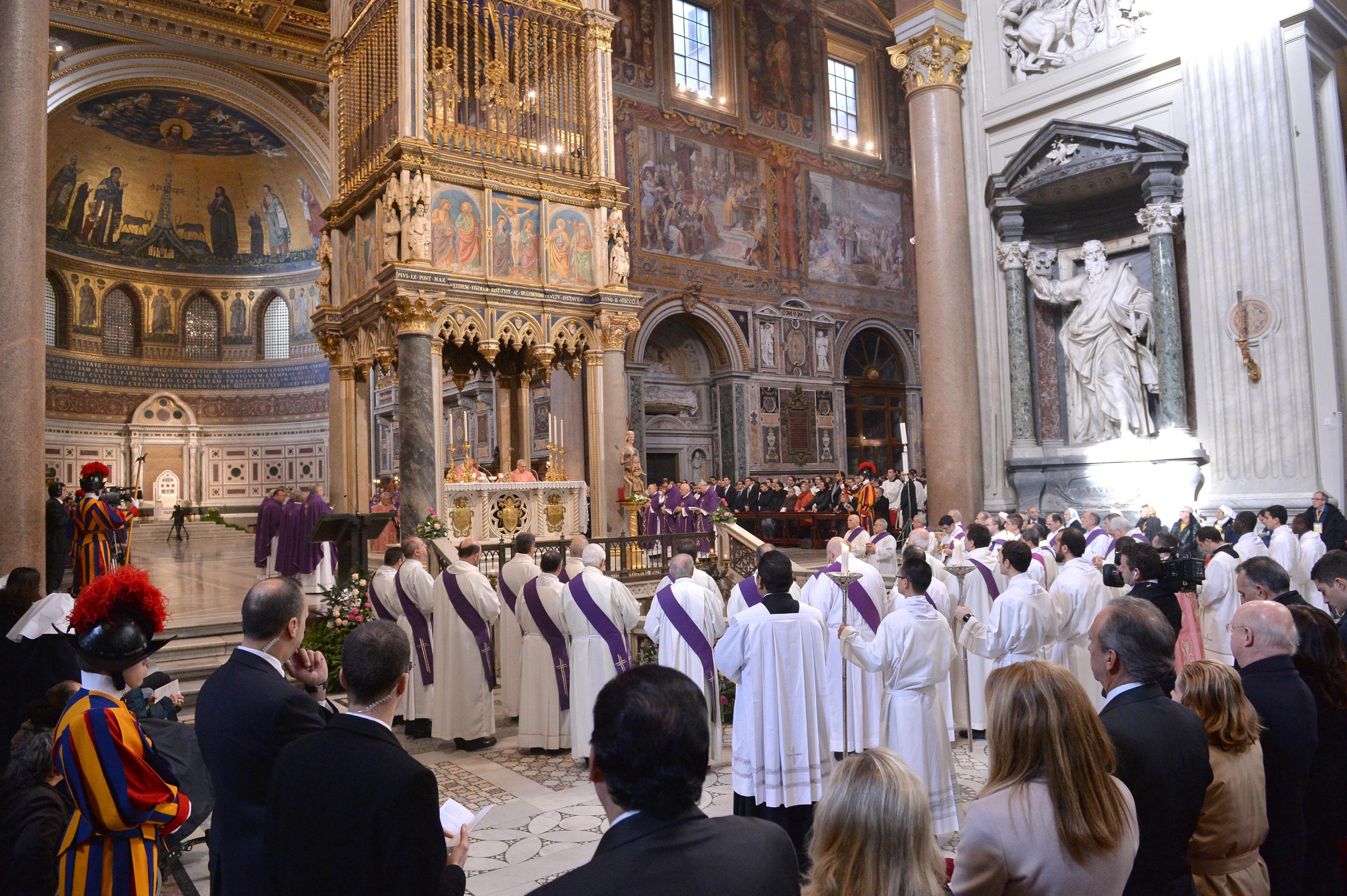 Pope Francis leads the mass after opening the Holy Door of St John Basilica