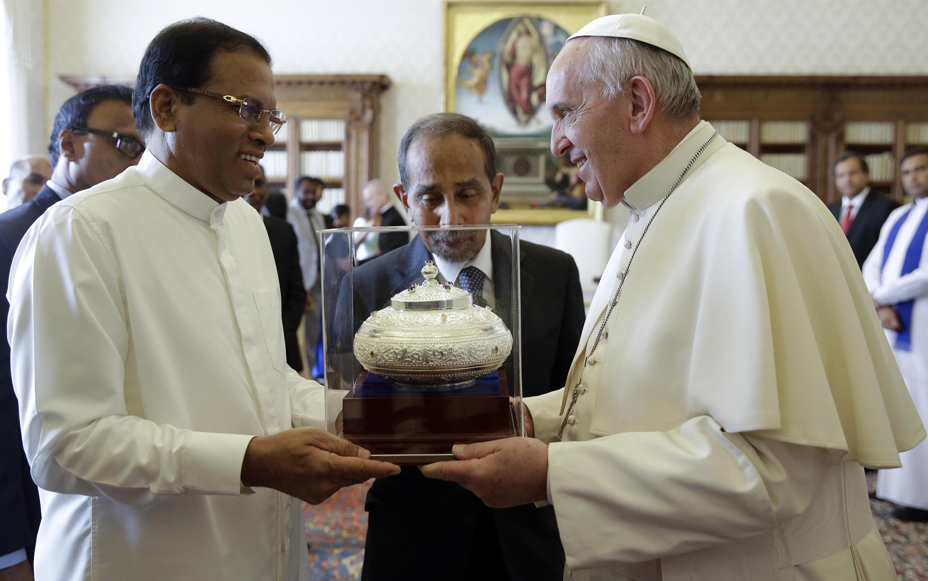 Pope Francis meets with Sri Lankan President Maithripala Sirisena during a private audience at the Vatican