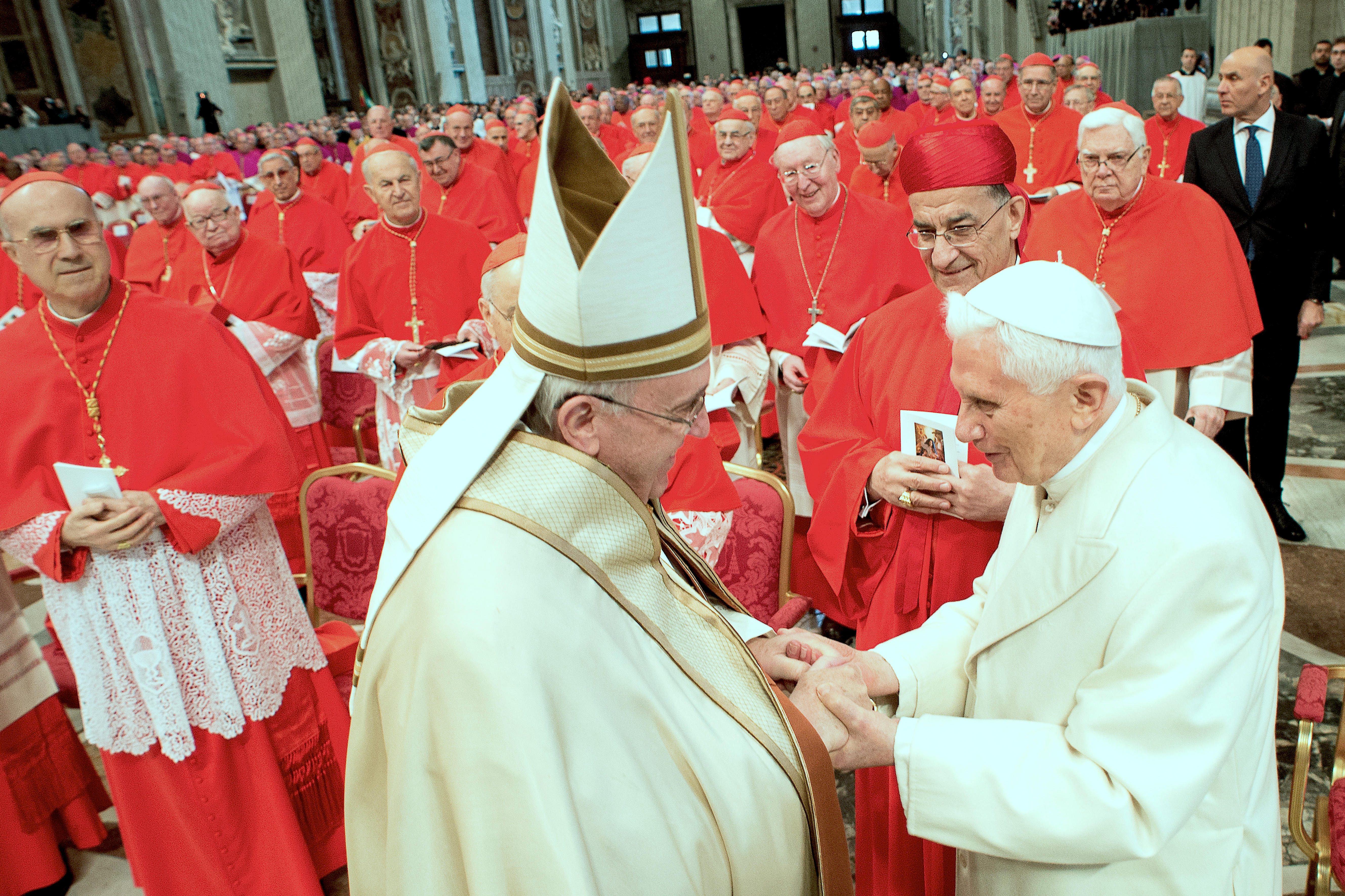Pope Francis meets Benedict XVI during the Ordinary Public Consistory for the creation of new Cardinals